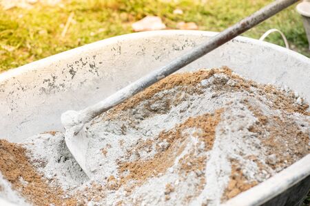 Worker labor, Mixer operator building staircase with concrete cement and brick at construction site.の写真素材
