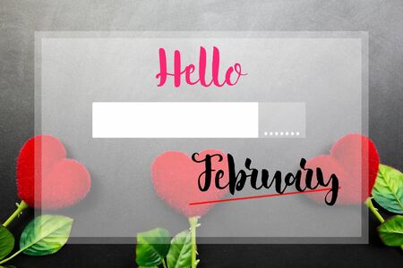 Hello February words on red heart flowers and black background.の写真素材