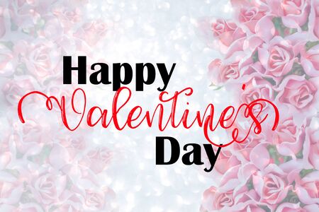 Happy valentine's Day words on pink rose background.の写真素材