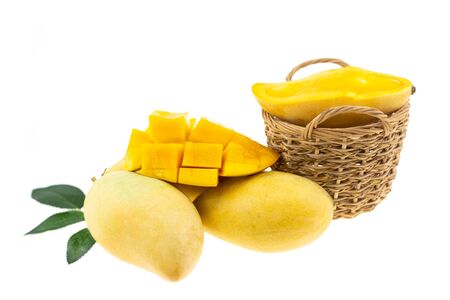 Yellow mango and mango slice isolated white background.の写真素材