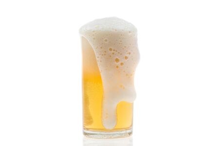 Frosty glass of light beer isolated on white background.の写真素材