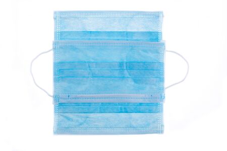 Medical mask of blue color for protection against flu or virus, epidemic and other diseases.の写真素材