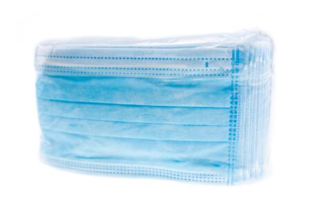 Medical mask of blue color for protection against flu or virus, epidemic and other diseases.の写真素材