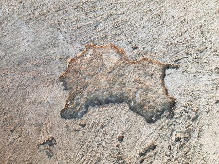 Grunge concrete cement floor with crack in industrial building. Cracked cement floor.の写真素材