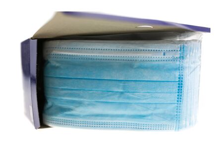 Medical mask of blue color for protection against flu or virus, epidemic and other diseases.の写真素材