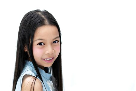 Asian girl smiling isolated on white background.の写真素材