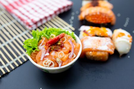 Sushi, Sashimi with chopsticks, Japanese sushi with soy sauce and wasabi.の写真素材