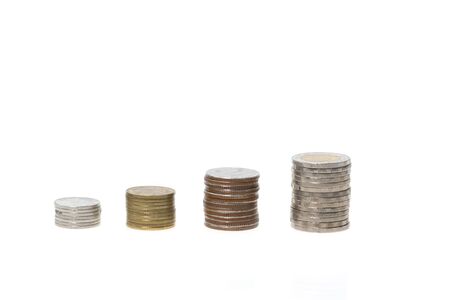 Saving money concept stack growing business. Thai Baht coins on white background.の写真素材