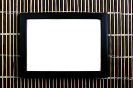 Black picture frame on black wooden background.の写真素材