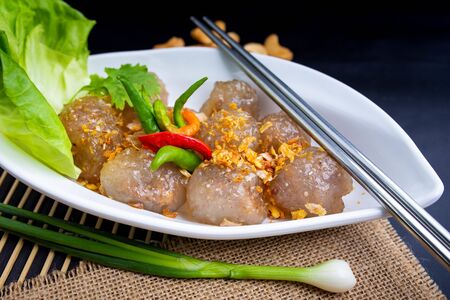 Thai snack Sakoo Sai Moo or steamed tapioca balls filled with pork recipe. Sago Pork Balls Thai Desserts.の写真素材