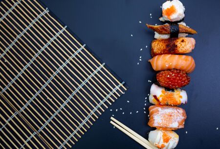 Sushi, Sashimi with chopsticks, Japanese sushi.の写真素材