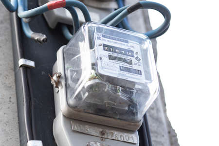 Nakhon Sawan, Thailand - April 19, 2020: Electric transformer on Electric pole. Watthour meter of electricity for use in home appliance.のeditorial素材