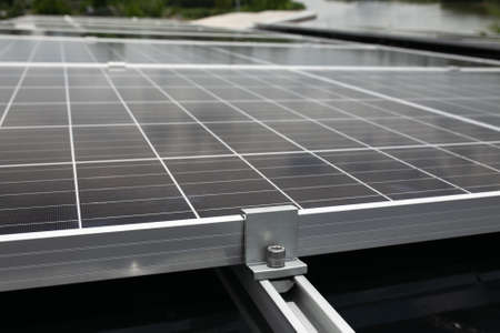 Closer of solar panels under bright sun.