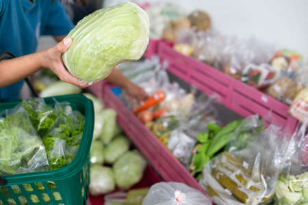 Vegetable department in a supermarket for a sale.の写真素材