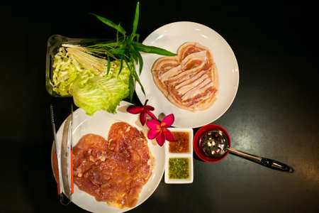 Pork, meat or seafood and vegetables on the hot pan, Korean Barbecue in Thai style.  Moo-Kata.の写真素材