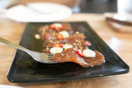 Salmon marinated shoyu or salmon pickled soy sauce in Korean style.の写真素材