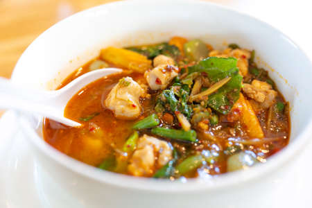 Forest curry or jungle curry in a bowl isolated on white, Spicy Thai curry from the forested areas of Thailand. a kind of Thai curry 'Kang-Paa-Kai'.の写真素材