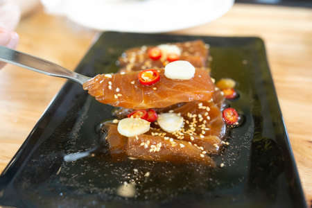 Salmon marinated shoyu or salmon pickled soy sauce in Korean style.の写真素材