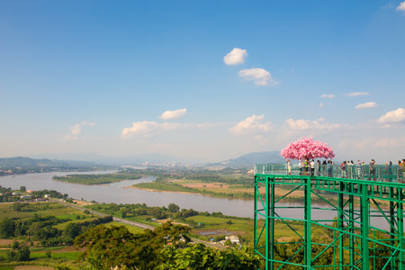 Chiang Rai, Thailand - November 3, 2022: Visitors walk on sky walk at Wat Phra That Pha Ngao in Chiang Saen district, Golden Triangle of Thailand, Myanmar and Laos.のeditorial素材