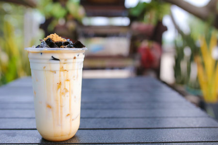Cold drinks grass jelly with caramel mixed milk tea.の写真素材