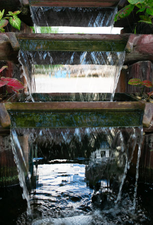Waterfall in the tropical garden, Thailand. Selective focus.の写真素材