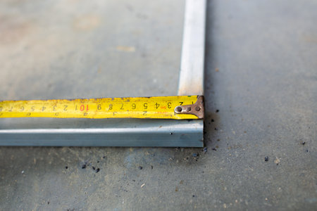 measuring tape on the floor in the construction site, close upの写真素材