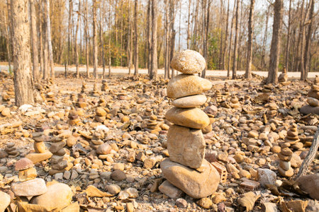 A pile of stones on the ground in the forest, Thailand.の写真素材