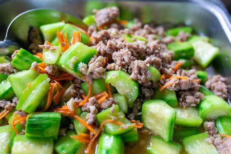 Stir-fried cucumber with minced pork, Thai food.の写真素材