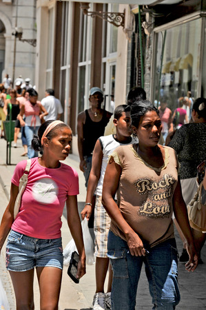 HAVANA, CUBA, MAY 6, 2009  A woman selling roses on a street in Havana, Cuba, on May 7th, 2009 のeditorial素材