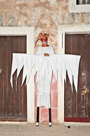HAVANA, CUBA, MAY 5, 2009  People standing on peg legs dressed in scary costumes in Fit Cuba 2009 tourism festival in Havana, Cuba, on May 5th, 2009のeditorial素材