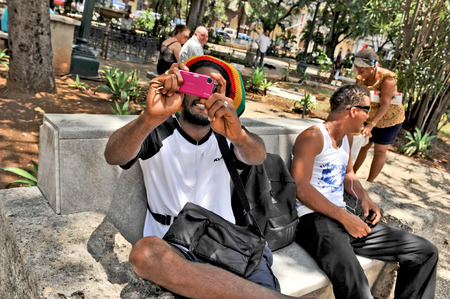 REMEIDOS, CUBA, MAY 7, 2009  Two women and two men dressed in traditional Cuban suits, in Remeidos, Cuba, on May 7th, 2009 のeditorial素材