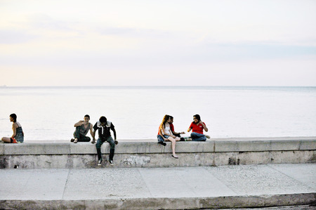HAVANA, CUBA, MAY 5, 2009  People hanging out in Fit Cuba 2009 tourism festival held in the Castle of the Three Kings of Morro in Havana, Cuba, on May 5th, 2009 のeditorial素材