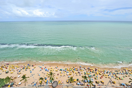 Recife, Pernambuco, Brazil, 2009, olinda, daytime, day, a wall, colours, suburb of Recife, mosaic of colours, a man, headgear, costume, headdress, cowl, man in a costume, head-dress, man with a headgear, hat that looks like an animalの写真素材