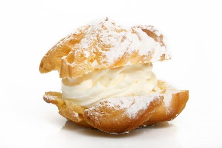 nice polish typical puff cake with cream over white background