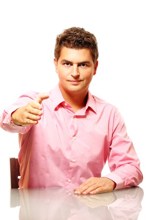 Young confident businessman inviting to do business with him or to join his teamの写真素材