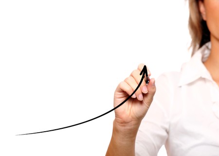 A picture of a businesswoman with an arrow going up over white backgroundの写真素材