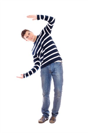A picture of a young man presenting something over white backgroundの写真素材