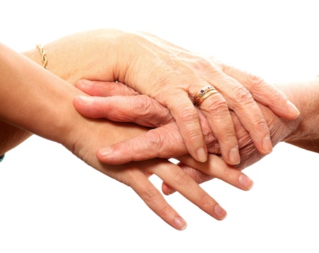 A picture of young and old hands against white backgroundの写真素材