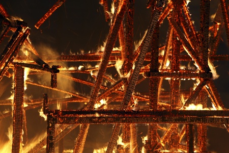 A picture of smoking ruins during the nightの写真素材