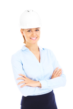 Young woman in white helmet over white backgroundの写真素材