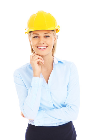 Young woman in yellow helmet over white backgroundの写真素材
