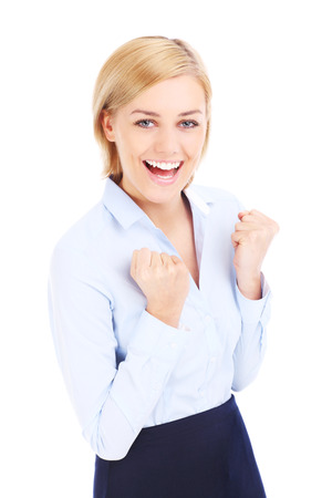 Happy business woman with hands up over white backgroundの写真素材