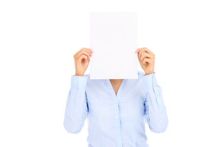 Businesswoman holding blank paper over white backgroundの写真素材