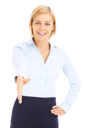 A picture of a young businesswoman greeting you over white backgroundの写真素材