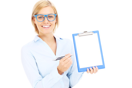 A picture of a young businesswoman with documents over white backgroundの写真素材