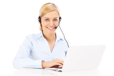 A picture of a happy teleworker working on a laptop over white backgroundの写真素材