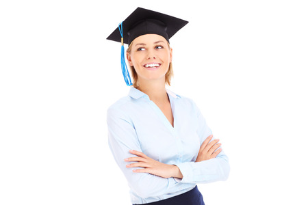 A picture of a young graduate cheering over white backgroundの写真素材