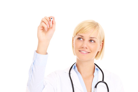 A picture of a young doctor writing on board over white backgroundの写真素材
