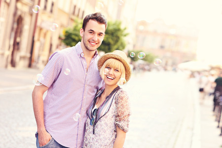A picture of happy tourists in the Old Town of Gdansk in Polandの写真素材