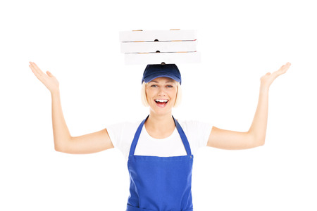 A picture of a happy woman with pizza boxes over white backgroundの写真素材
